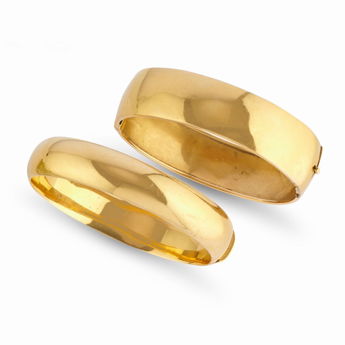 Quattro bracciali, oro giallo 18k