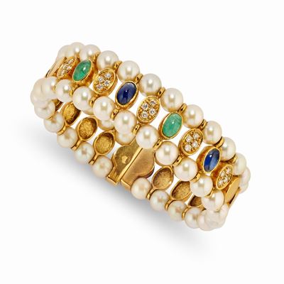 Bracciale in oro giallo 18k con perle coltivate, zaffiri e smeraldi