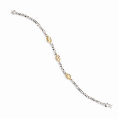 Bracciale in oro bicolore 18K con diamanti incolore e fancy yellow