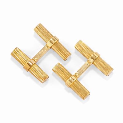 Coppia di polsini in oro giallo 18k, peso 9,70 g