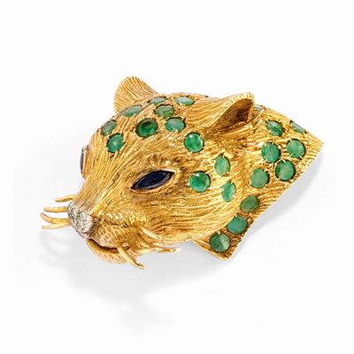 Spilla leopardata in oro giallo 18k, decorata con smeraldi, zaffiri e diamanti