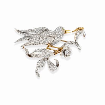 Spilla decorativa in platino e oro rosso 18k con diamanti e smeraldo