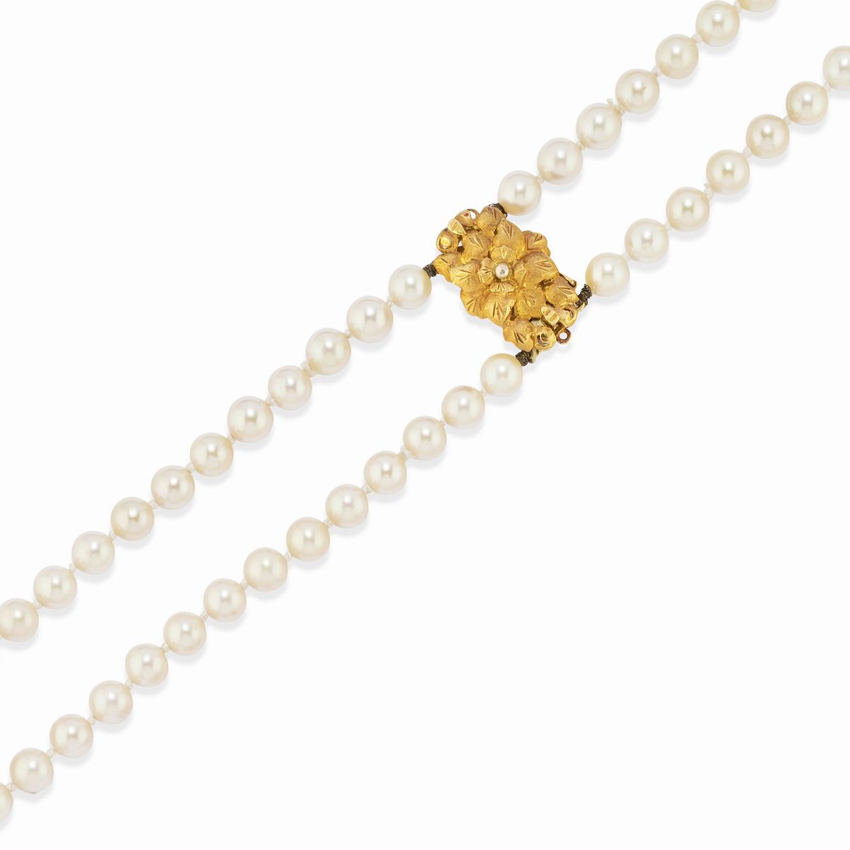 Due collane e un bracciale in oro giallo 18k con perle coltivate