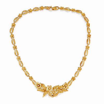 Collana in oro giallo 18k, lavorazione a foglie e fiori
