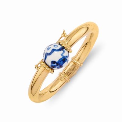 Bracciale rigido in oro giallo 18k con boules in ceramica bianca e blu