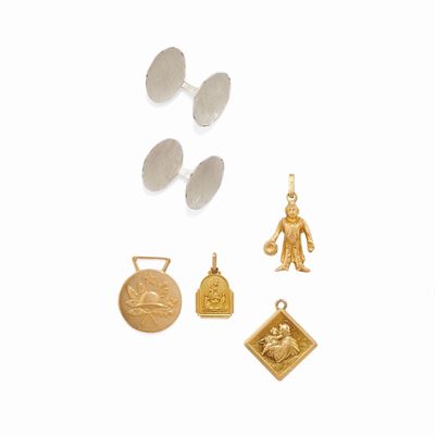 Pendente e coppia di polsini in oro bicolore 18k