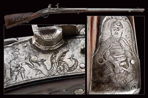 An interesting snaphance lock gun with carved stock and signature Picchio