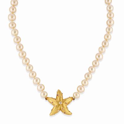 Collana in oro giallo 18k con perle rosa e decorazioni in rubini e diamanti