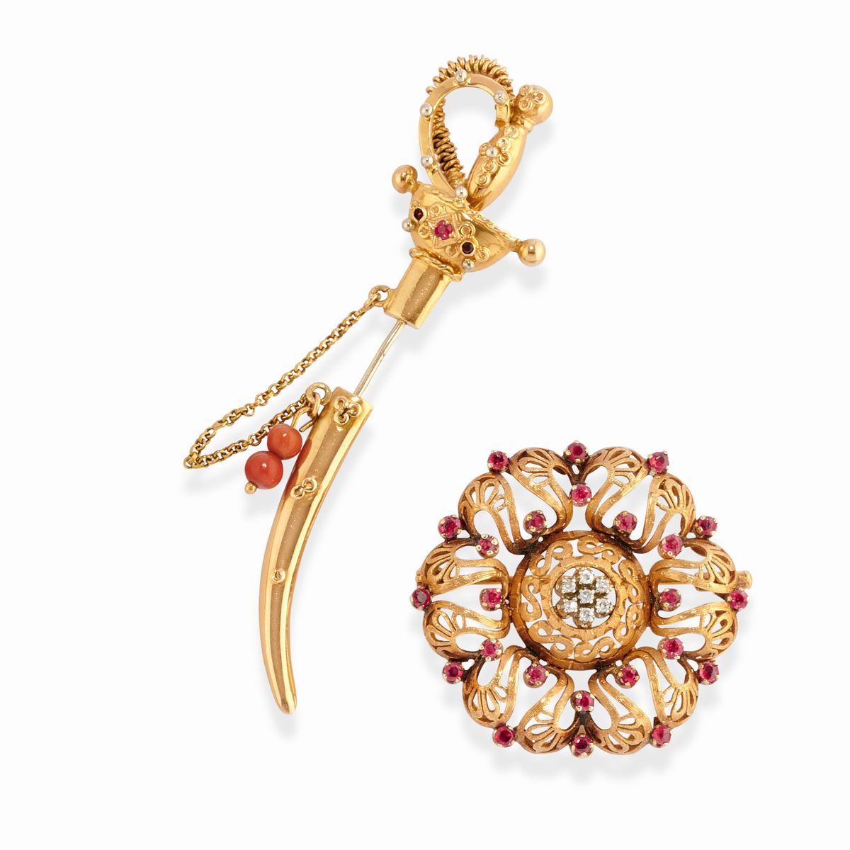 Due spille in oro giallo 18k con gemme