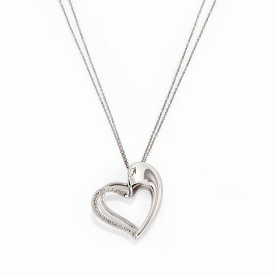 Collana in oro bianco 18k con pendente a cuore in diamanti