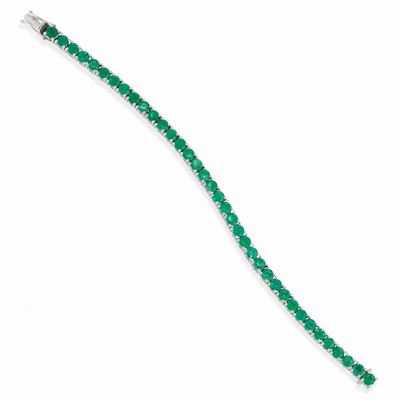 Bracciale tennis in oro bianco 18k con smeraldi colombiani