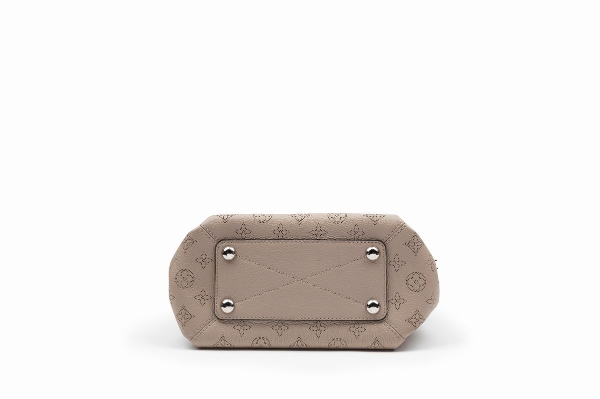 Louis Vuitton - Borsa Babylone, in pelle Mahina monogram traforata