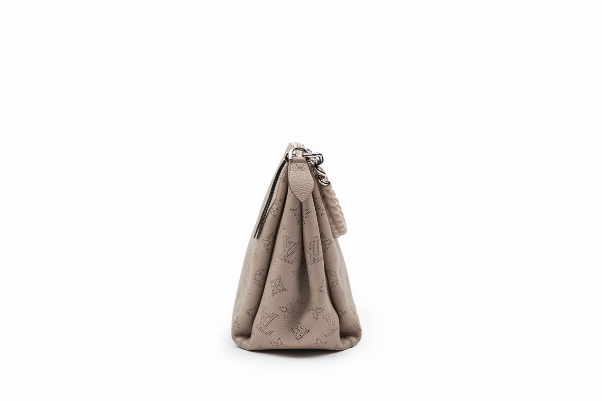 Louis Vuitton - Borsa Babylone, in pelle Mahina monogram traforata