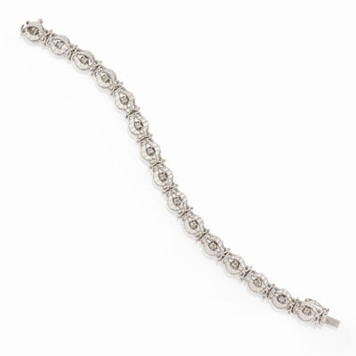 Bracciale in oro bianco 18k con motivi tondi e pietre sintetiche