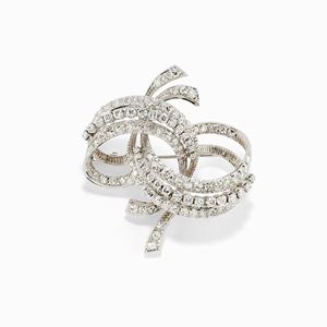 Spilla in oro bianco 18K e diamanti taglio brillante e huit-huit