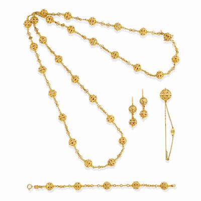 Parure in oro giallo 18k, 14k e 9k