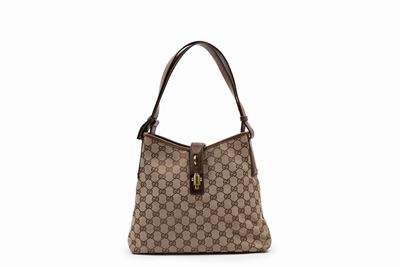 Borsa in tela logata beige con dettagli in pelle marrone