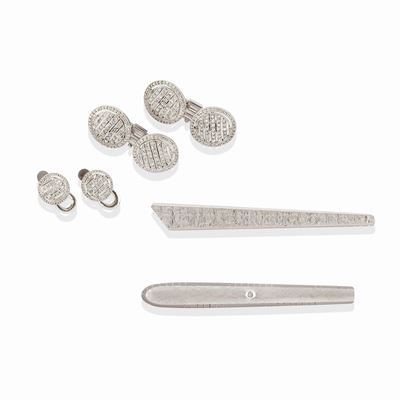 Due fermacravatte in oro bianco 18k, decorati con diamanti