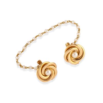 Spilla in oro giallo 18k con motivo floreale e perla