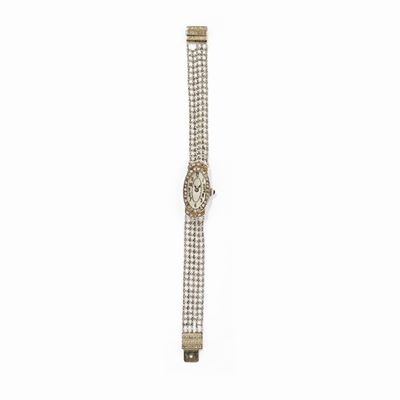 Orologio, oro bianco 18k con lunetta in diamanti e movimento a carica manuale, circa 1920