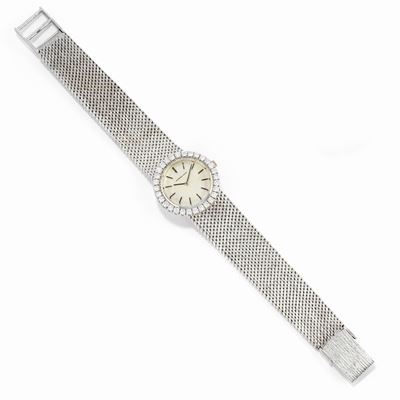 Orologio in oro bianco 18k con quadrante chiaro e lunetta in diamanti