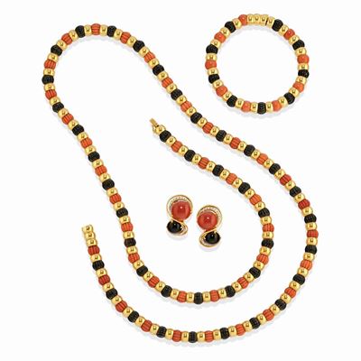 Demi-parure in oro giallo 18k con corallo e onice