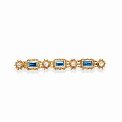 Spilla, oro bicolore 18k con zaffiri e diamanti