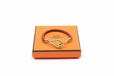 Bracciale Jumbo H in metallo dorato e pelle intrecciata bicolore