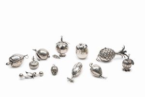 Eleven silver and metal Christmas decorations