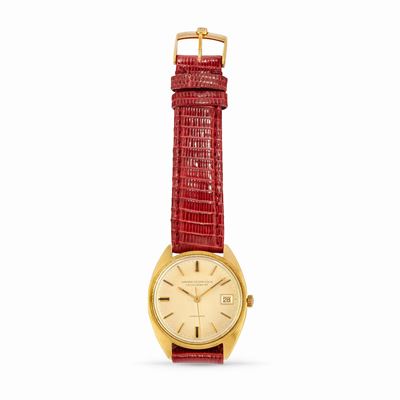 Orologio, in oro giallo 18k con movimento a carica automatica