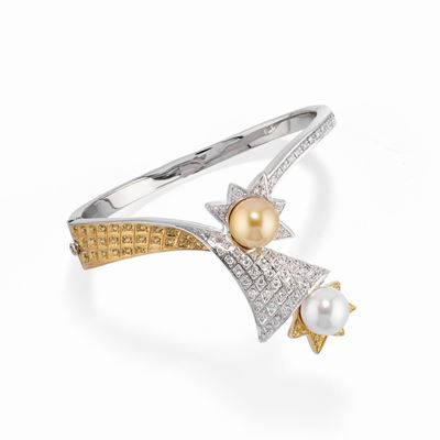 Bracciale in oro bicolore 18k con perle coltivate australiane e gemme