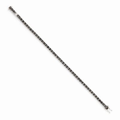 Bracciale tennis in oro bianco 18k con diamanti neri e incolore