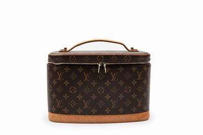 Beauty-case in tela monogram con profili in vacchetta