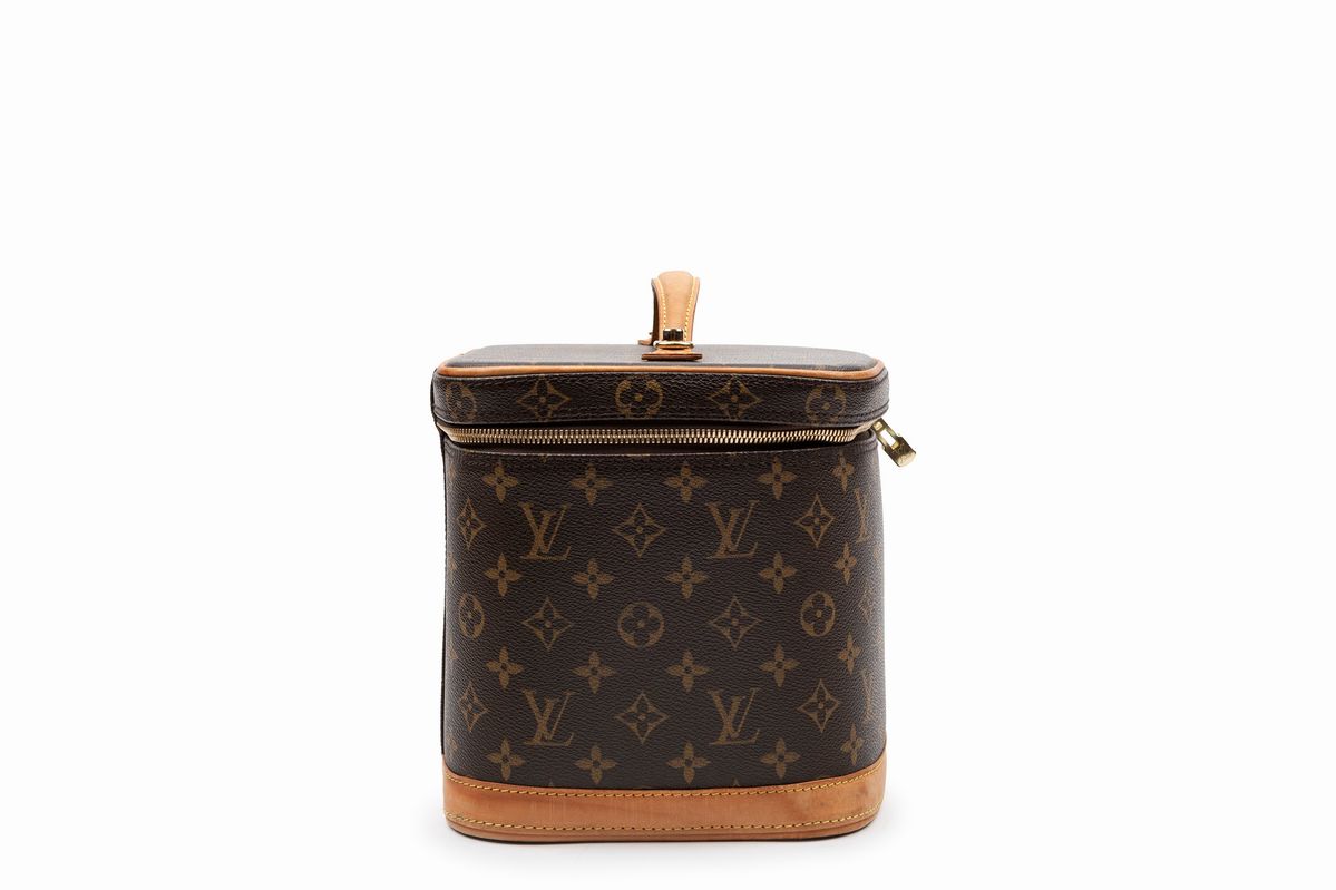 Louis Vuitton - Beauty-case in tela monogram con profili in vacchetta
