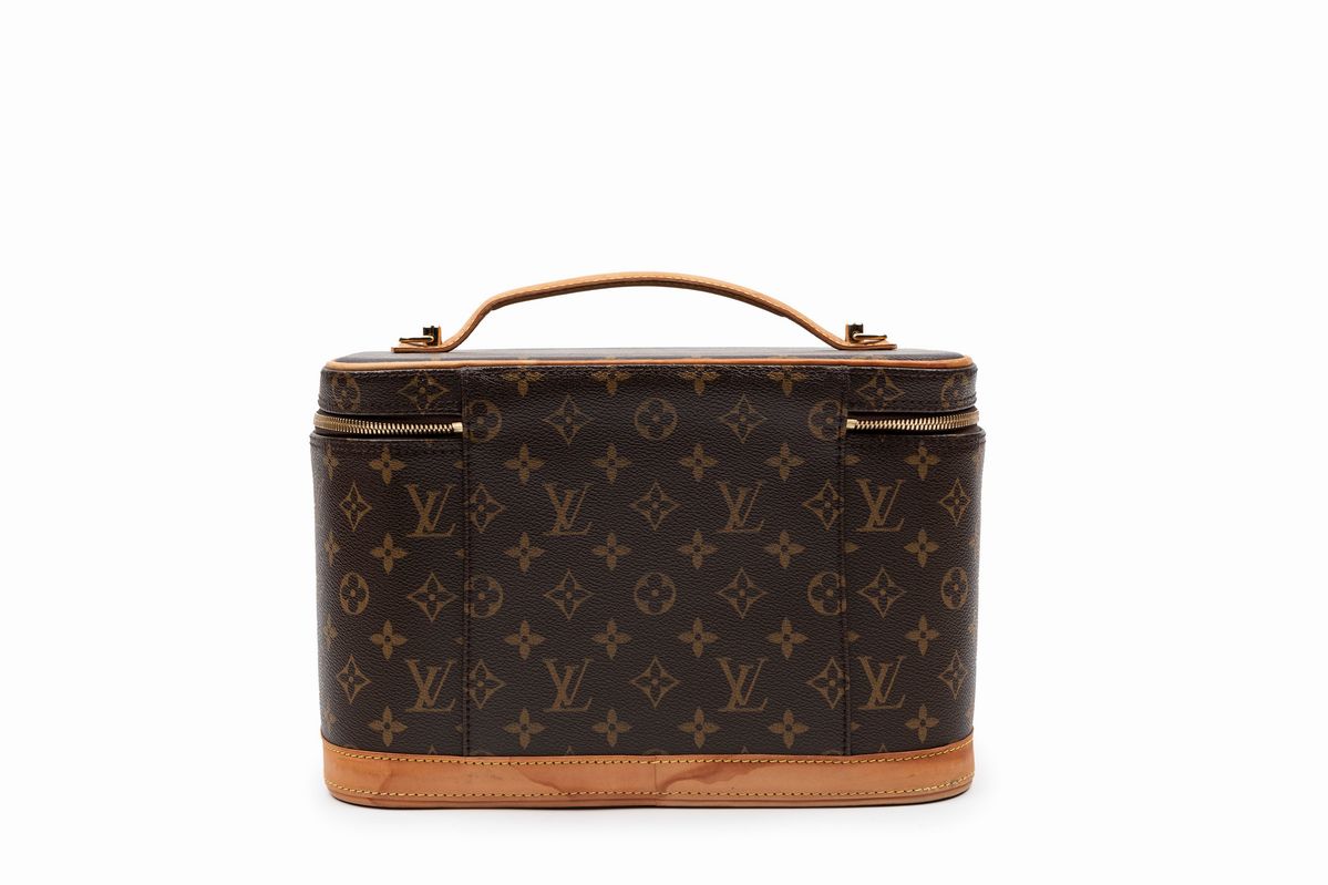 Louis Vuitton - Beauty-case in tela monogram con profili in vacchetta