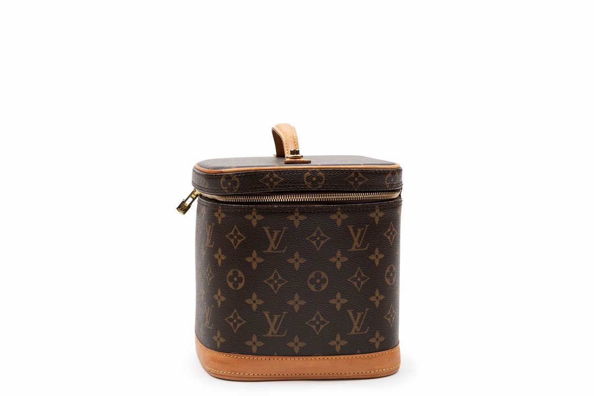 Louis Vuitton - Beauty-case in tela monogram con profili in vacchetta