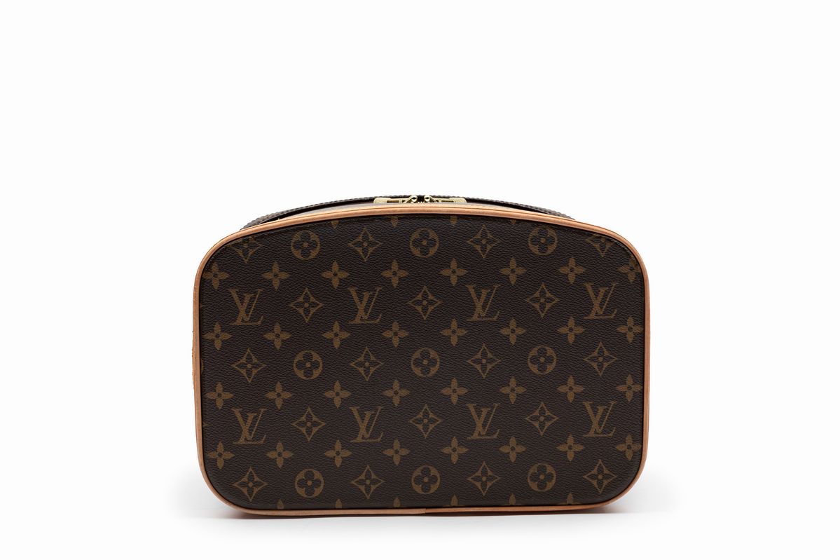 Louis Vuitton - Beauty-case in tela monogram con profili in vacchetta