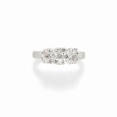 Anello in oro bianco 18k con diamanti, design floreale