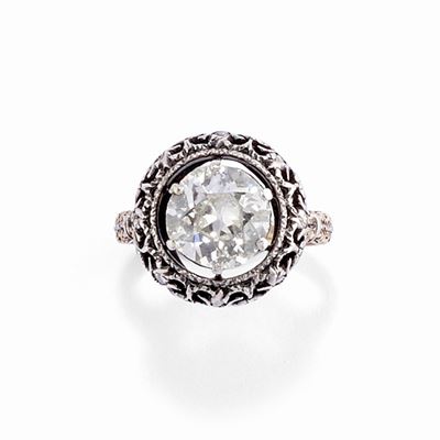 Anello con diamante taglio vecchio in argento e oro, inizio XX secolo