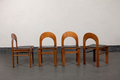 Quattro sedie in legno con seduta in pelle, circa 1970
