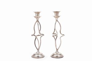 Couple of sterling silver candlesticks