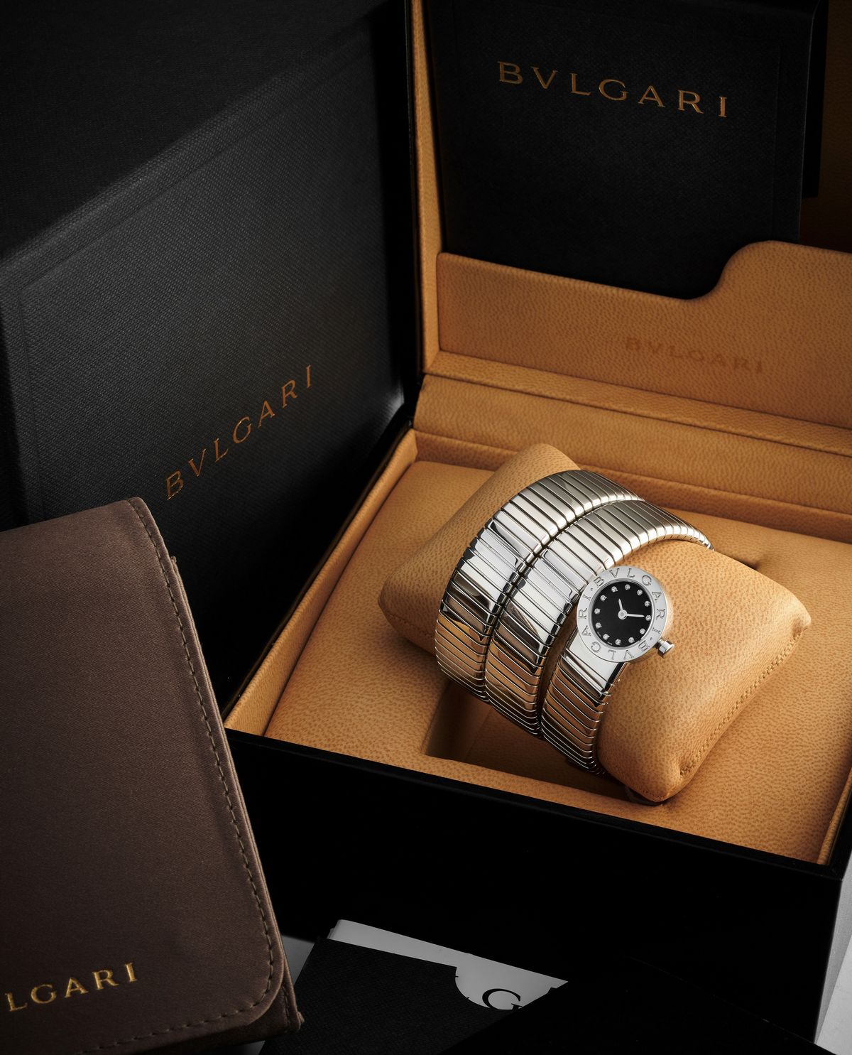 Bulgari - Orologio 'Serpenti' in acciaio con quadrante nero e indici in diamanti