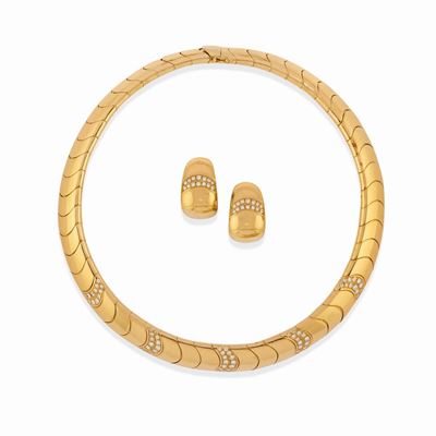 Demi parure in oro giallo 18k con diamanti taglio brillante