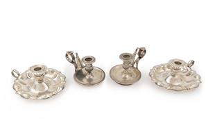 Two pairs of silver candle holder