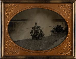 Untitled (Three men posing in front of the Niagara Falls)