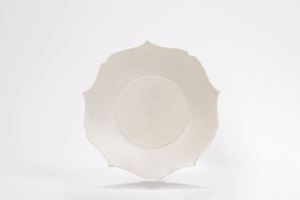 A RARE WHITE-GLAZED BRACKET-LOBED DISH