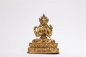 A GILT-BRONZE FIGURE OF AVALOKITESVARA