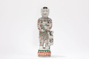 A FAMILLE VERTE FIGURE OF A BOY