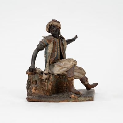 Figura da Presepe in Cartapesta, Tela e Legno di Tiglio Dipinto, Raffigurante Moro Seduto, Sicili...