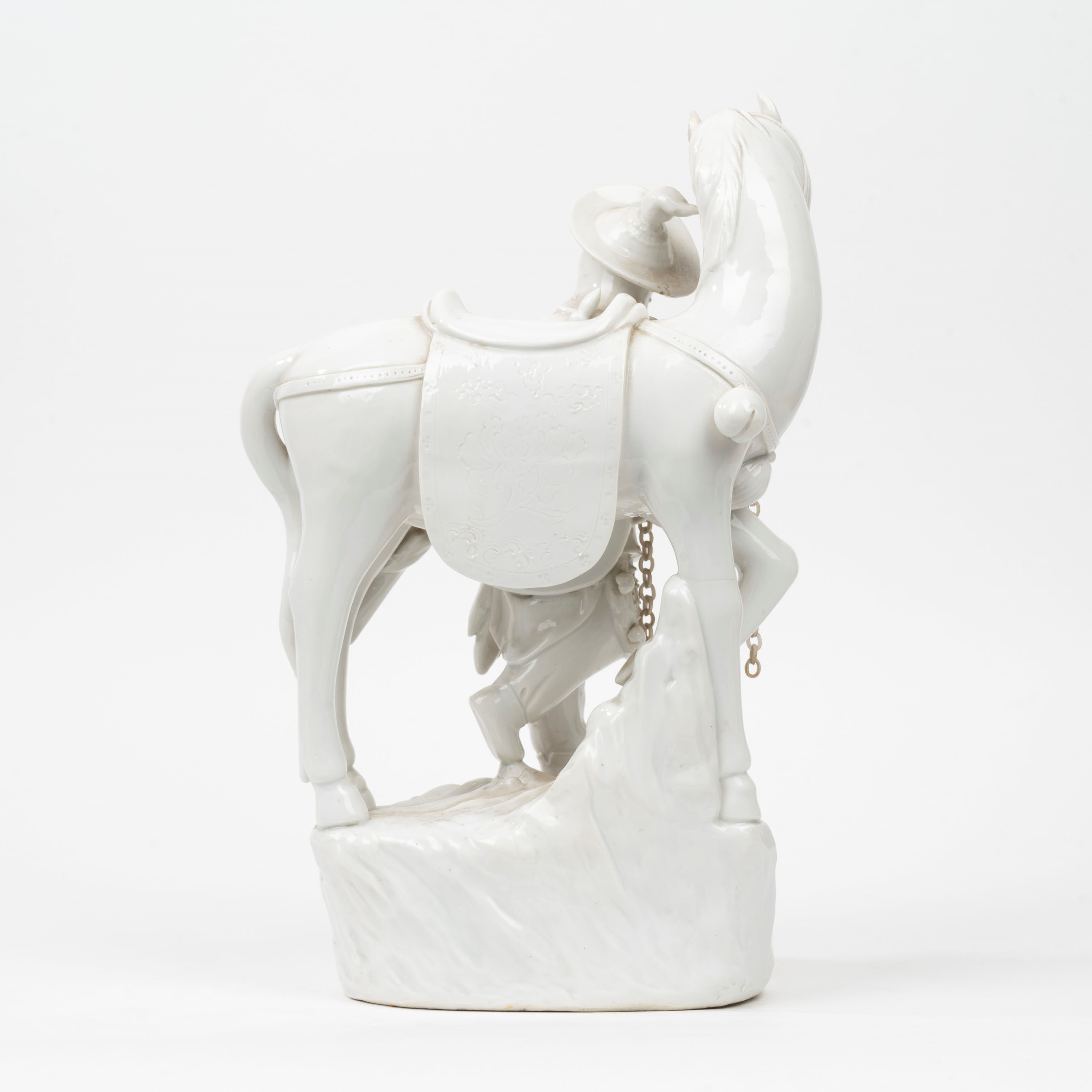 Scultura in Porcellana Blanc De Chine Raffigurante Cavallo con Cavaliere, Cina, Secoli XIX-XX